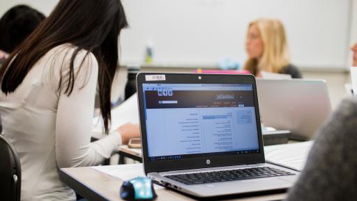 students on their computers stuyding