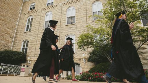 students in graduation robes